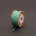 Handwoven cotton cord spool in blue and green gradient for DIY jewelry making - Landscape Green