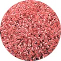 DIY glass seed beads featuring a transparent shell with a vibrant coral pink dyed core - Orange Red