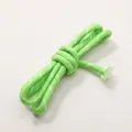 Green braided polyester cord with white dots for DIY jewelry making and bracelets - Spotted Grass Green