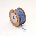 Light blue hand-twisted cotton thread roll on kraft paper spool for DIY bracelet making - Haze Blue