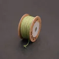 Handwoven grass green cotton cord on spool for DIY jewelry and phone chain crafting - Tea Green