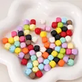 Colorful rhombic acrylic spacer beads in a white ceramic tray for DIY jewelry making - Random Mixed Colors