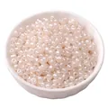 Creamy white 4mm glass seed beads with pearl finish for DIY jewelry in a white bowl - Beige