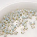 Ciondolo in pietra naturale sfaccettata azzurra con anello dorato per creazioni DIY - 4mm (2 Pezzi/Confezione) / Acquamarina (BTB1179)