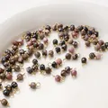 Ciondoli in pietra naturale sfaccettata rosa e nera con anellini dorati per gioielli - 4mm (2 Pezzi/Confezione) / Rodonite (BTB1179)