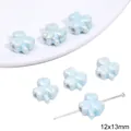 Light blue 12x13mm clover-shaped ceramic bead with pearlescent finish and horizontal hole - 12x13mm / Clover (5532104770627) / 2 Pieces/Pack / Light Blue