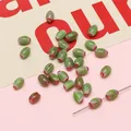 Green oval Millefiori glass beads with red and white star stripes for DIY jewelry - 10 Pieces/Pack (6x9mm, Hole 1mm) / Green