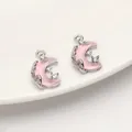 Hellrosa Mondsichel-Anhänger mit silberner Metallbasis und kleinen funkelnden Kristallen - Mond Anhänger (Weiß K Farbe Rosa Glas)