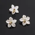 Miniature white resin flower charm with pearl finish and gold loop for DIY jewelry - Large Bauhinia Style (BSB115) / 5 Pieces/Pack (Approx. 3.5mm)