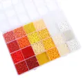 DIY-kit met 24 vakken met rode, oranje en gele glaskralen voor het maken van sieraden - Rood Geel Wit Mix