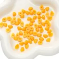Yellow triangular acrylic doll nose beads for DIY plush toys and handmade crafts - 7X9mm / Yellow