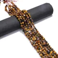 Strands of irregular tiger eye stone beads with natural chatoyant texture for DIY jewelry - 5-8mm / Tiger's Eye
