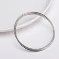 Bobines de fil d'acier argenté de 6cm pour création de bijoux DIY et perles artisanales - Pack de 10 Boucles (Épaisseur 0,6 mm, Diamètre 6 cm) / Nickel