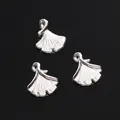 Three silver ginkgo leaf alloy charms for jewelry DIY on a black reflective surface - Ginkgo Leaf Pendant / 12x15mm (10 Pieces/Pack) / Silver