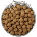 Natural brown Rudraksha beads with wrinkled texture in a decorative silver dish - Rudraksha Style