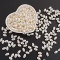 Perles ovales en ABS blanc crème pour bijoux DIY dans un bol en forme de cœur - Style Ovale / 6x10mm (100 Pièces/Paquet) / Poche zippée