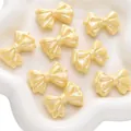Set of 8 pearlescent pale yellow acrylic bow beads for DIY bracelet and necklace jewelry - Stackable Design / Pack of 2 (29x22mm) / Yellow