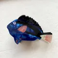 Detailed close-up of a blue tropical fish hair claw clip with a marbled acetate finish - Royal Blue