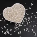 Perle finte bianco crema a forma di riso in piatto di ceramica a cuore per progetti DIY - Perline di conteria / 3x6mm (100 Pezzi/Confezione) / Beige