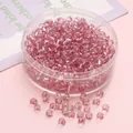 Pink 4mm glass seed beads in a round plastic container for DIY jewelry making - Deep Pink