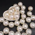 Perle rotonde in ABS bianco avorio lucido per la creazione di gioielli artigianali fai-da-te - Perline rotonde / 25mm (5 Pezzi/Confezione) / Beige