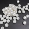 Perle tonde in ABS bianco lucido in ciotola a cuore per creazione di gioielli fai da te - Perline rotonde / 18mm (10 Pezzi/Confezione) / Bianco