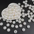 Perle tonde bianche in ABS lucido in piatto a cuore per creazione di gioielli DIY - Perline rotonde / 12mm (50 Pezzi/Confezione) / Bianco