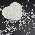 Perle bianche in ABS in una ciotola a cuore per creazione di gioielli fai-da-te - Perline rotonde / 5mm (200 Pezzi/Confezione) / Bianco