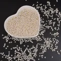 Perle in ABS color crema per gioielli fai-da-te in un piatto a forma di cuore - Perline rotonde / 3mm (400 Pezzi/Confezione) / Beige