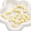 Charming cream yellow AB acrylic bow beads with iridescent finish for DIY jewelry - Round Edge Design / Pack of 5 (26x15mm) / Yellow