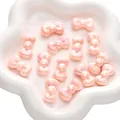 Pink iridescent acrylic bow beads for DIY jewelry making in a white ceramic dish - Round Edge Design / Pack of 5 (26x15mm) / Chrysanthemum Pink