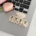 Creamy butterfly hair claw clip with pink heart-shaped rhinestones on laptop backdrop - Beige Rhinestone Heart