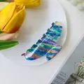 Detail view of rainbow acetate butterfly hair claw clip with colorful striped marble patterns - Large / Striped Multicolor