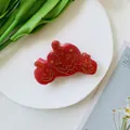 Macro shot of Halloween pumpkin hair claw clip with red marble texture and gold detailing - Red 3-Pumpkin