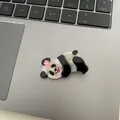 Detailed close-up of a cute panda hair claw clip with a pink flower on a keyboard background - Panda Flower Duckbill Clip / 4.5*2.5cm