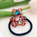 Macro shot of bear hair tie with colorful crystals and premium elastic band - 2-Red
