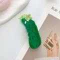 Detailed view of creative green pickle hair claw clip with black texture and leaf accents - Bitter Gourd Shape / Green