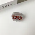 Close-up of cute grey acetate puppy hair claw clip with heart-shaped glasses - Gray Heart Glasses Dog (Small)