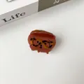 Close-up of brown acetate hair claw with funny dog face design and leopard print glasses - Coffee Heart Glasses Dog (Small)