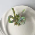 Pince à cheveux papillon en acétate texturé avec motif marbré de couleurs pastel - 6,5*5 cm / Bleu sarcelle