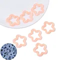 Lichtgevende perzikroze sterhangers voor DIY-sieraden met blauw glow-in-the-dark effect - Oranje