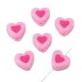 Pink heart-shaped acrylic beads with dark center, showing 6 pieces and piercing hole - Heart / 10 Pieces/Pack (17x15mm) / Pink