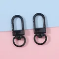 Pair of black metal swivel lobster clasps for DIY keychains and bag accessories - Width approx 12mm, Length approx 33mm, 5 Pcs/Pack / Black