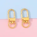 Paire de fermoirs mousquetons dorés en alliage pour bijoux DIY et accessoires de sacs - Largeur env. 12mm, Longueur env. 33mm, 5 Pcs/Paquet / Or