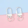 Mousquetons pivotants en U argentés pour sacs et porte-clés DIY sur fond bicolore pastel - Largeur env. 12mm, Longueur env. 33mm, 5 Pcs/Paquet / Argent