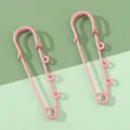 Orecchini a forma di spilla da balia rosa opaco con dettagli a spirale eleganti - 16x50mm / Rosa