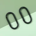 Set of two black oval carabiners with a semi-matte finish and spring gate clip hooks - 25x50mm / Black