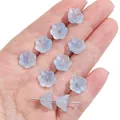 Light blue translucent lily of the valley glass flower beads held in hand for DIY jewelry - Sky Blue