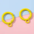Two pieces of 25mm bright yellow candy-colored metal spring clips for DIY keychains - Yellow