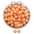 Vibrant orange iridescent acrylic round beads in a silver dish for DIY jewelry - Orange